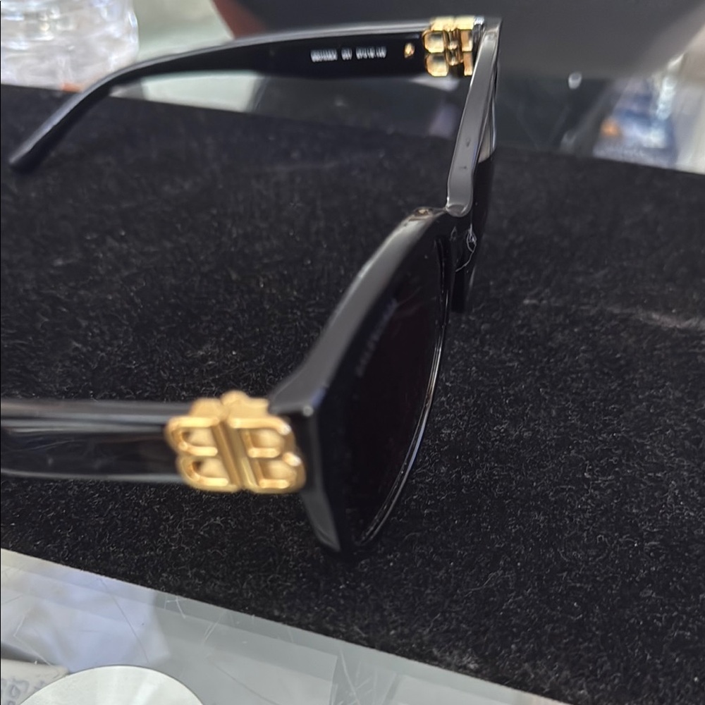 Balenciaga Black and Gold Sunglasses Modern Design
